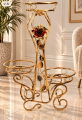 Ornate Gold Flower Stand in Elegant Interior.png
